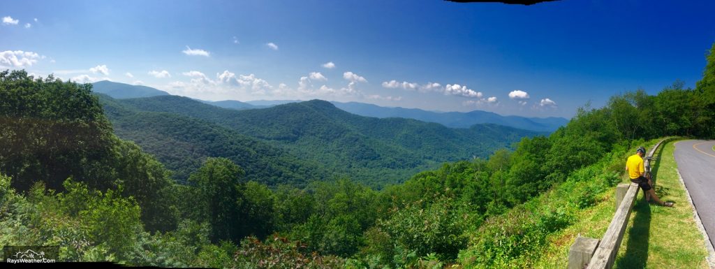 Panoramic View with Biker taking a break.